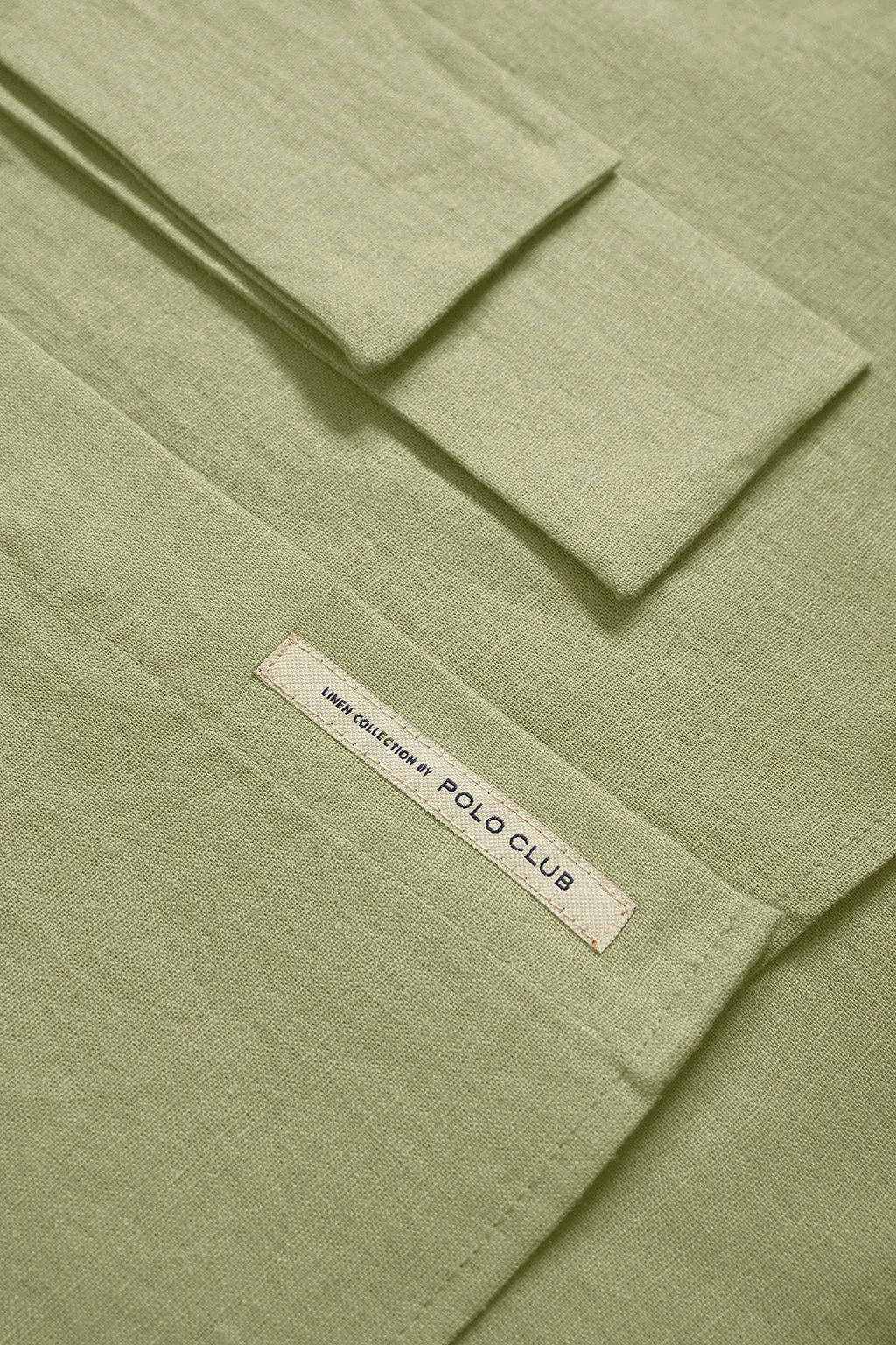 Vestido midi de lino verde con detalle bordado