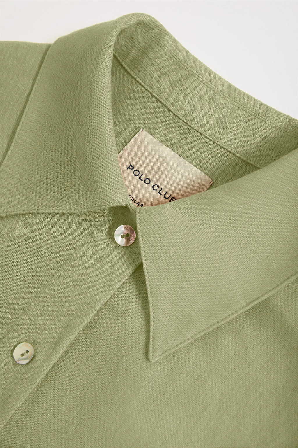 Vestido midi de lino verde con detalle bordado